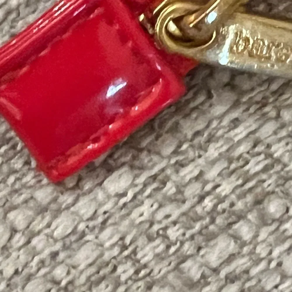 BareMinerals red patent leather medium size cosmetics bag